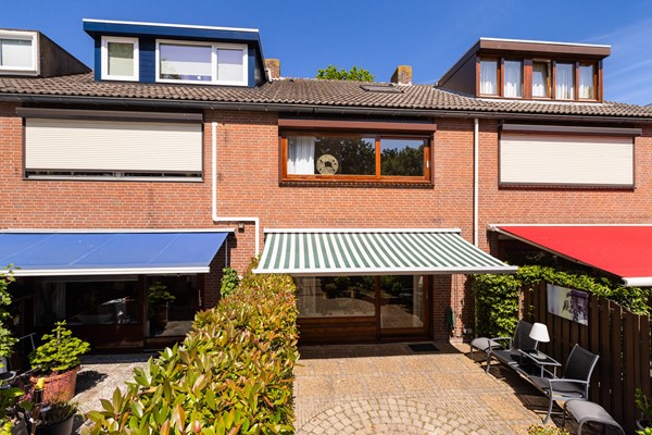 Foto - Te koop: Goed onderhouden tussenwoning in rustige woonwijk!